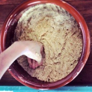 Pounding the soy beans to make miso